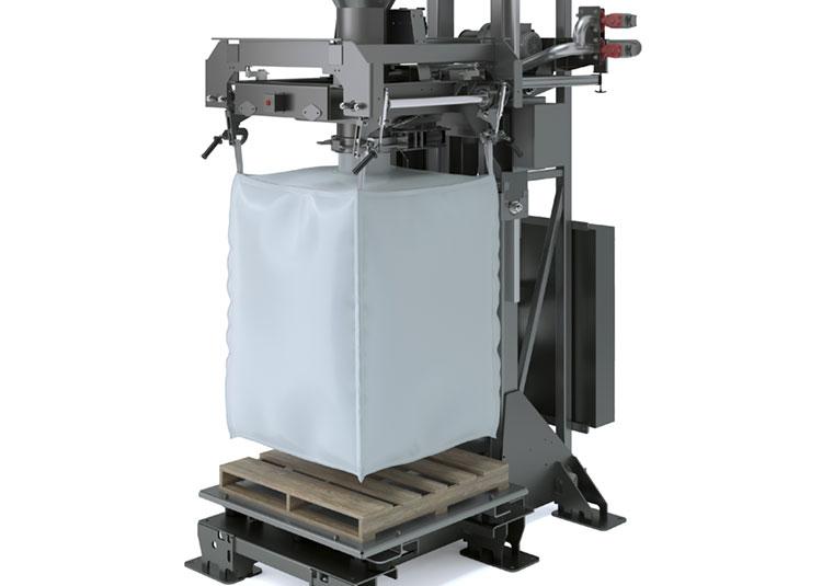 Automated bagging machine filling a large white bulk bag on a wooden pallet.